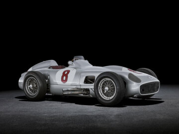 Mercedes-Benz Formula 1 racing car W 196 R with exposed wheels, 1955. Studio shot, exterior, from front left.