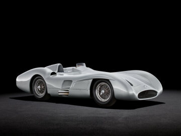 Mercedes-Benz Formula 1 racing car W 196 R with streamlined bodywork, 1955. Studio shot, exterior, from front left.